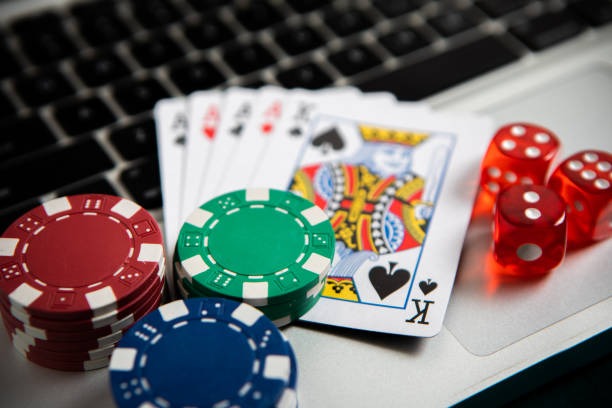 Live dealer studio with multi-camera broadcast showing real-time card settlement on mobile screen